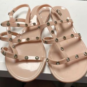 Also woman’s sandals neigh in color with glass beads on straps.